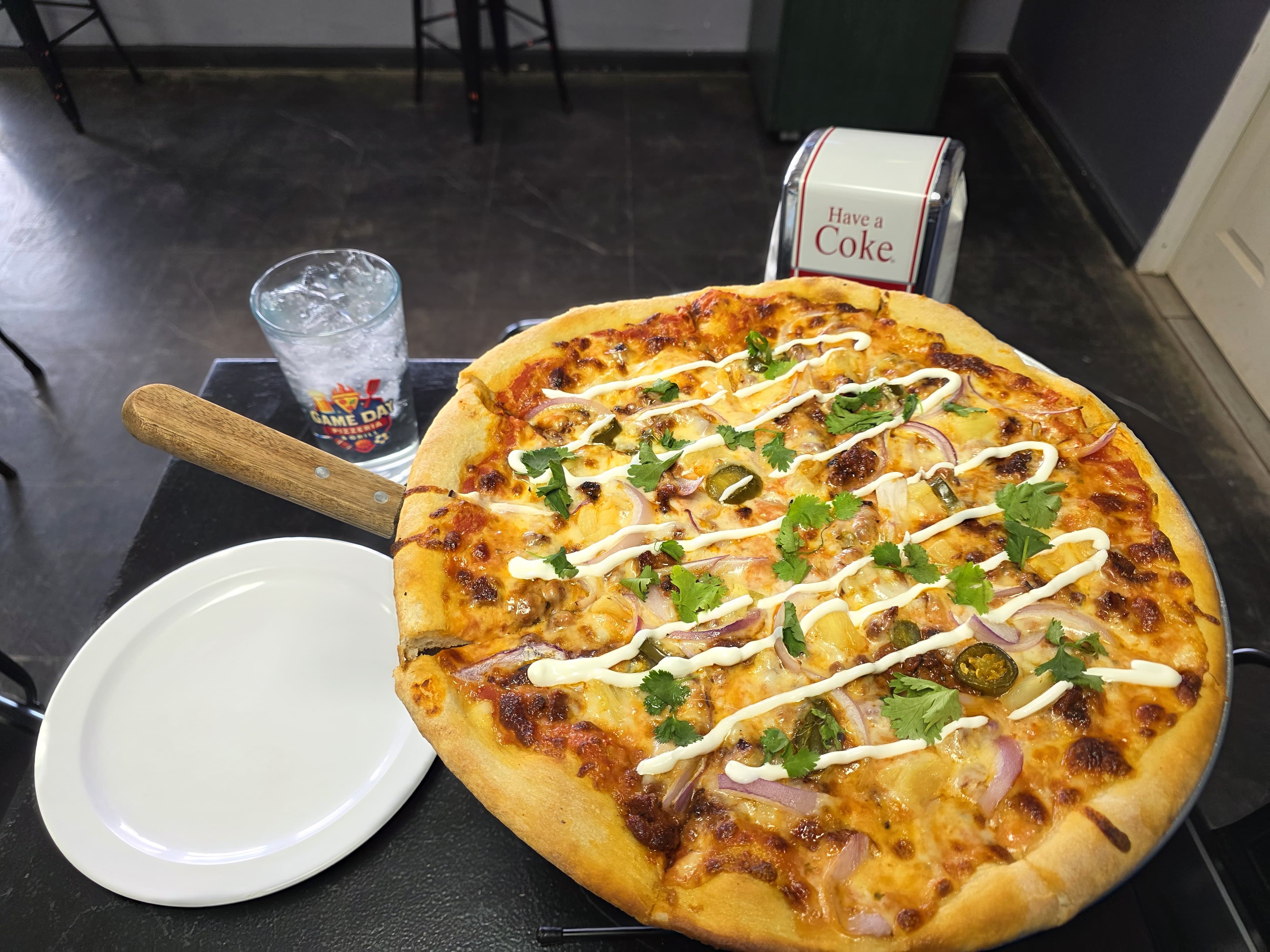 Fresh pizza at Game Day Pizzeria